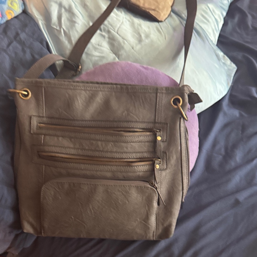 Crossbody relic purse new condition